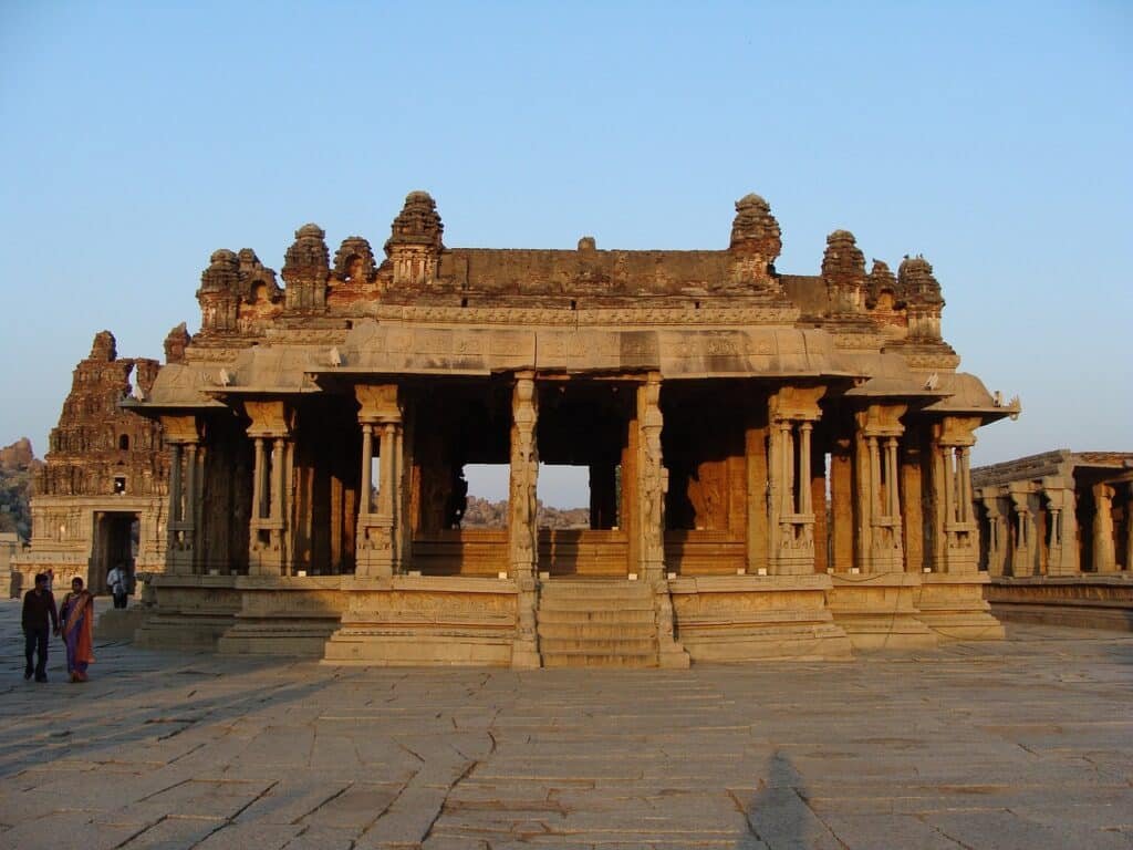 Hampi monuments in Karnataka front view where few persons visiting this beautiful place